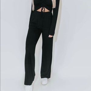 1 jumpsuit, 1 pair of cozy pants, 1 matching top